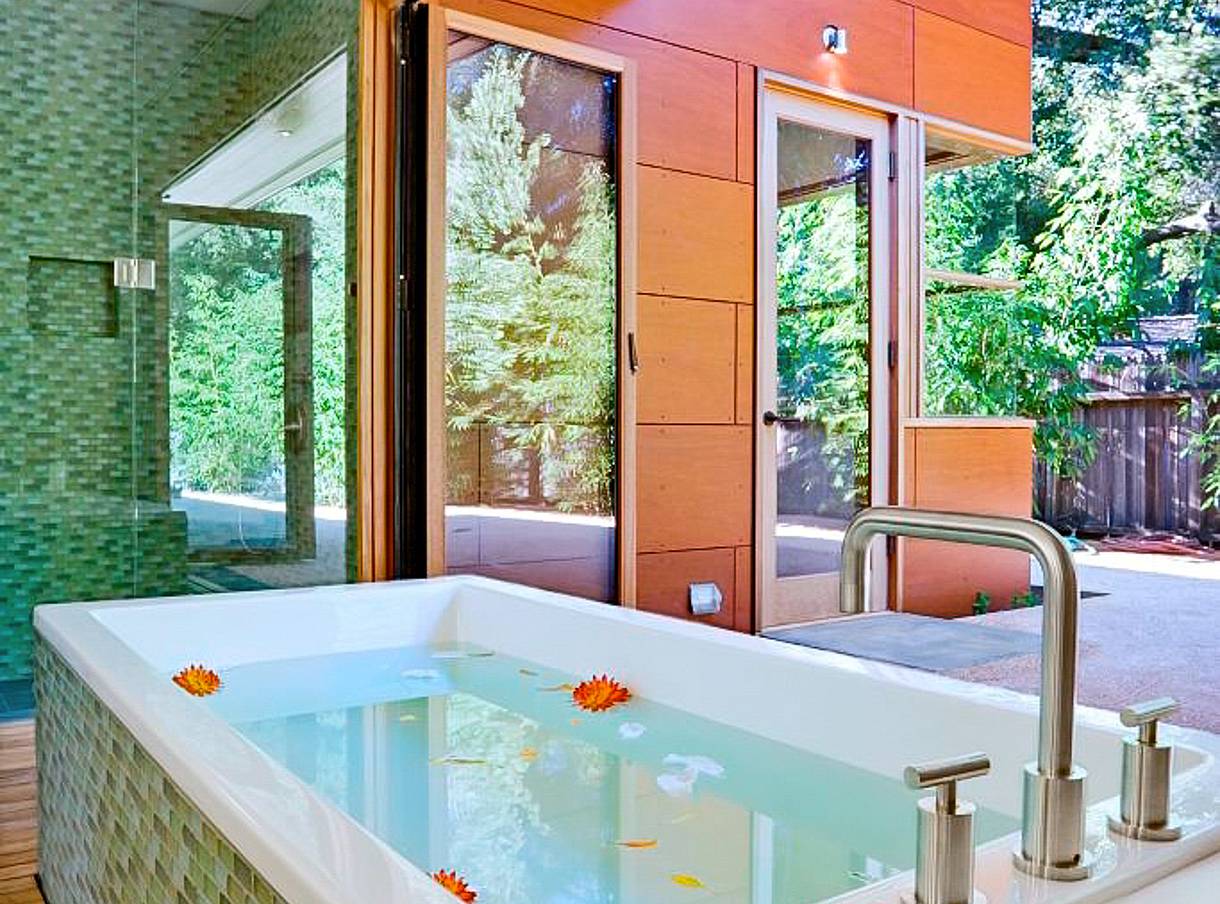retractable glass doors in bathroom design