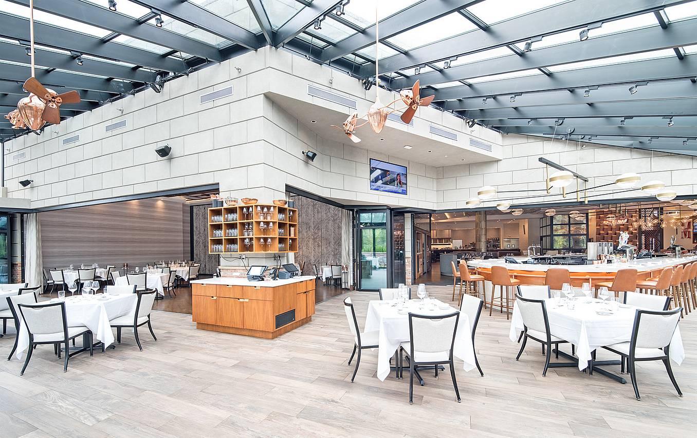 indoor outdoor dining with sliding glass wall design