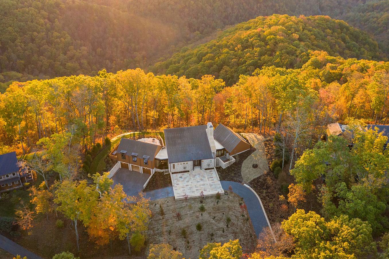 drone view of home with NanaWall minimal glass walls