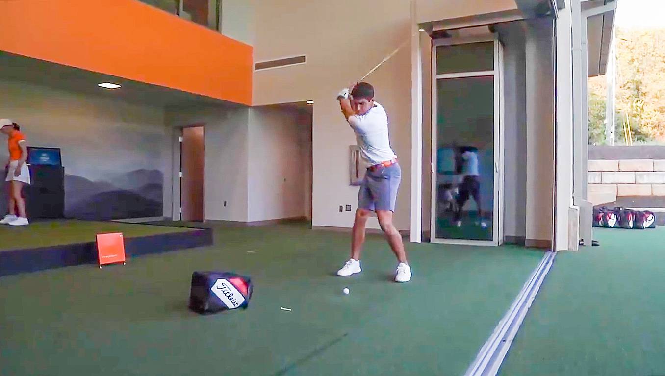 golfer with single track sliding glass wall system