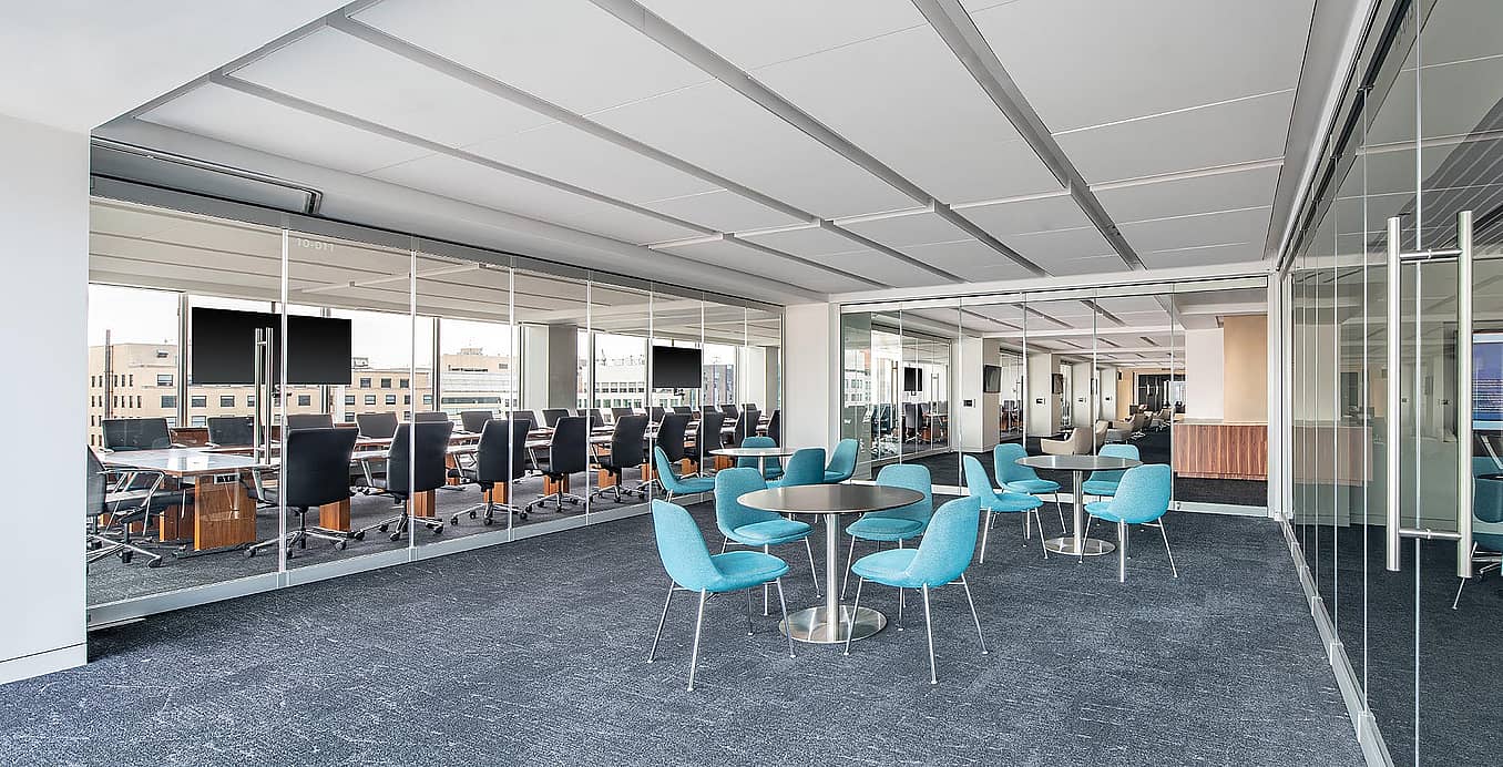 three-walls-of-frameless-glass-walls-in-office