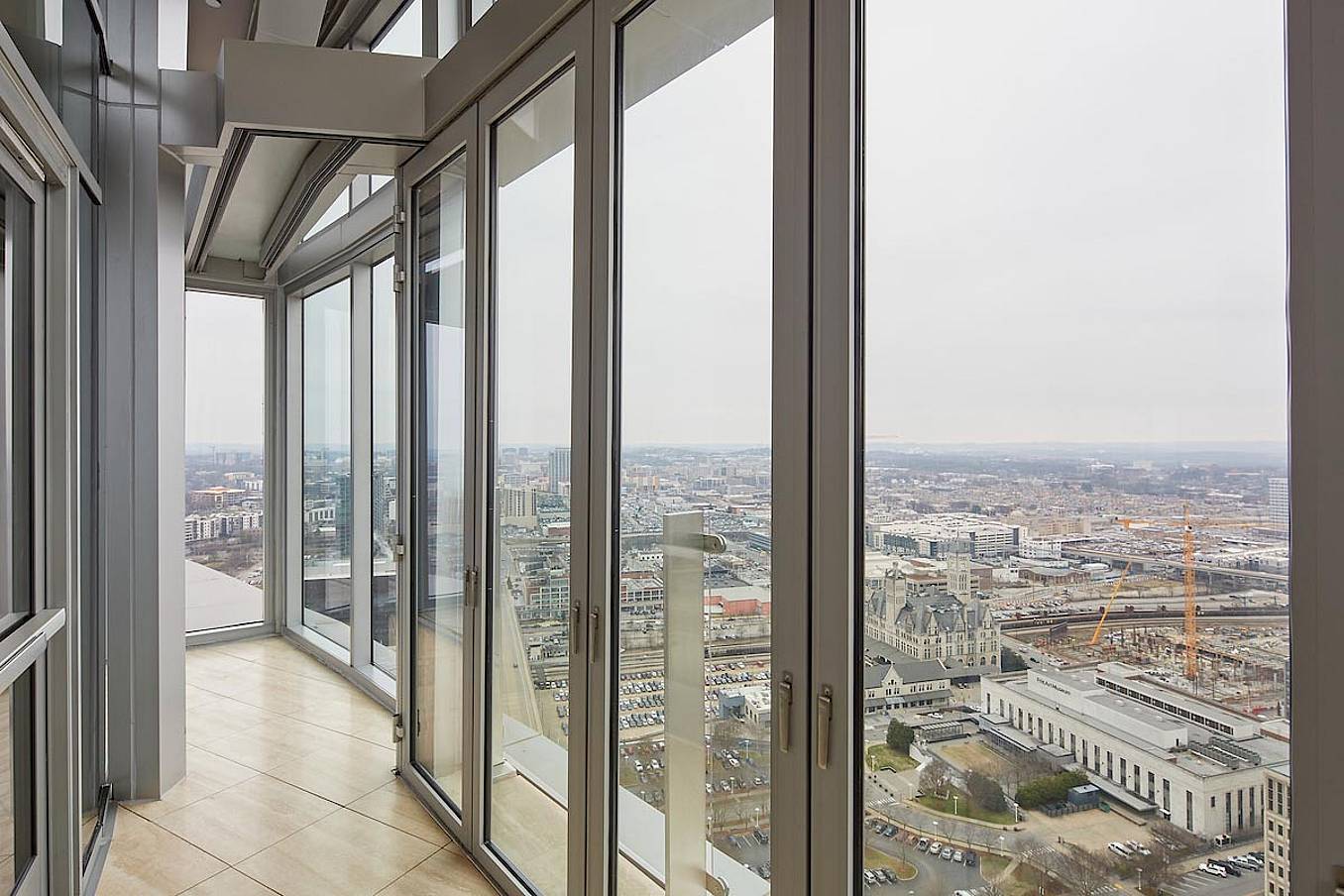 single-track-sliding-glass-system-with-panels-stacking-in-parking-bay