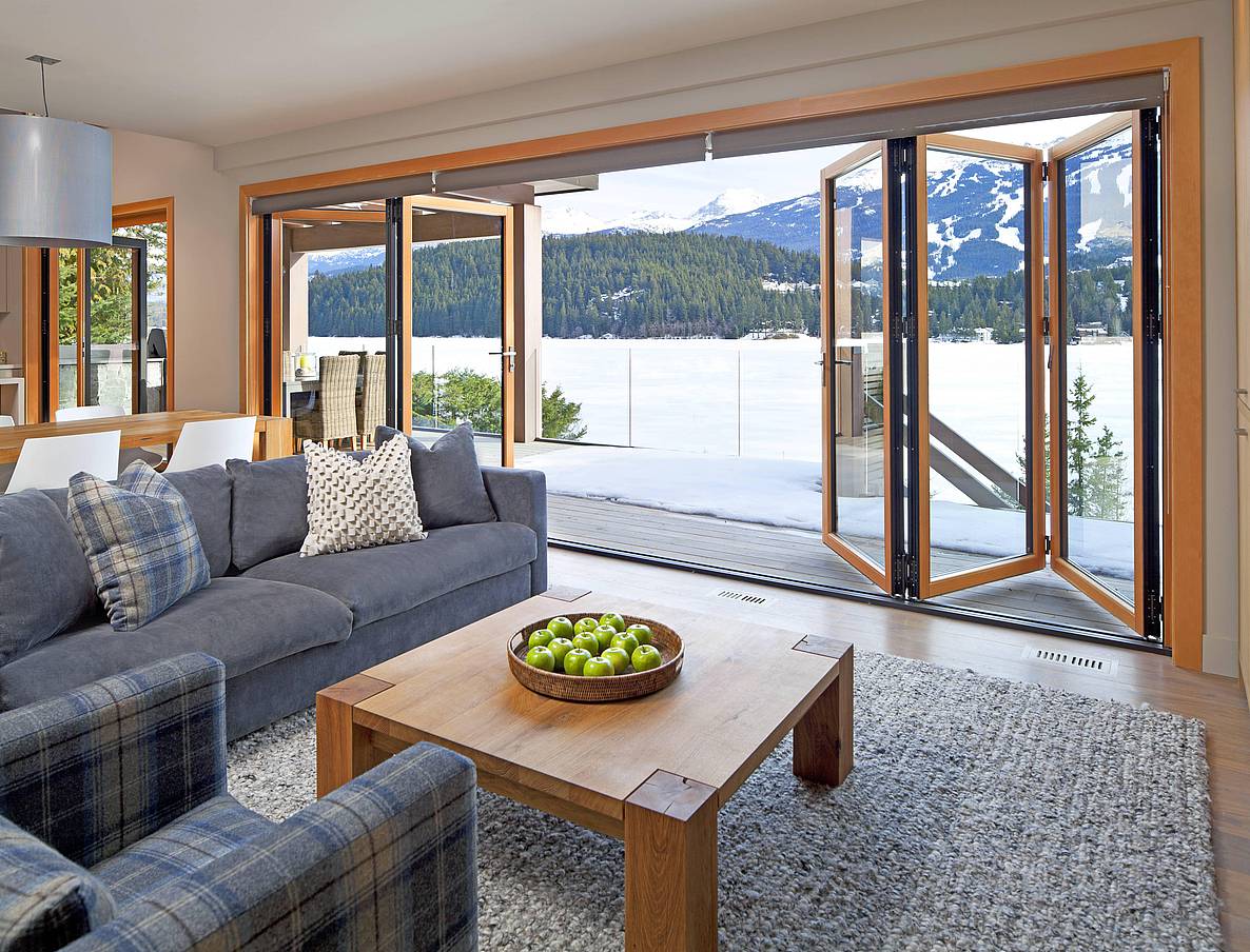 aluminum clad folding glass wall for energy efficiency and durability in snow