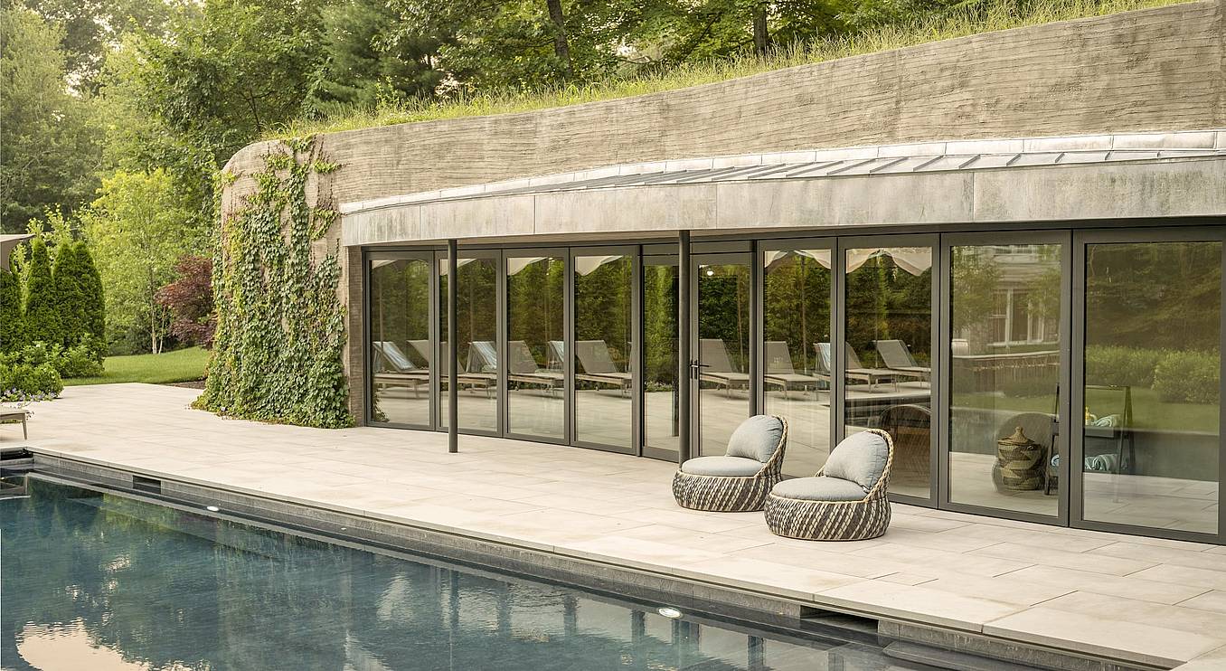 NanaWall sliding door system in pool house design