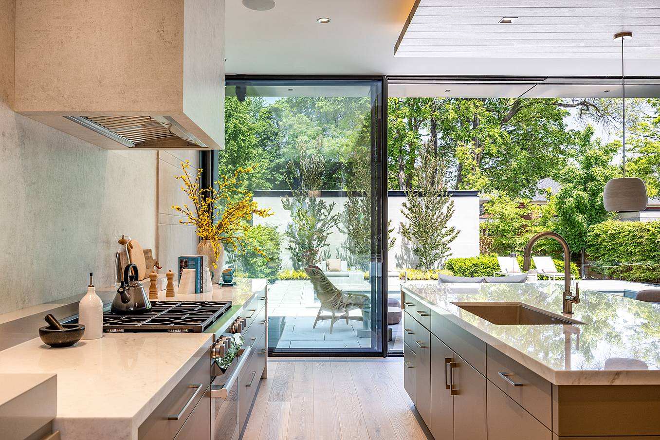 kitchen design with minimal sliding glass wall by NanaWall