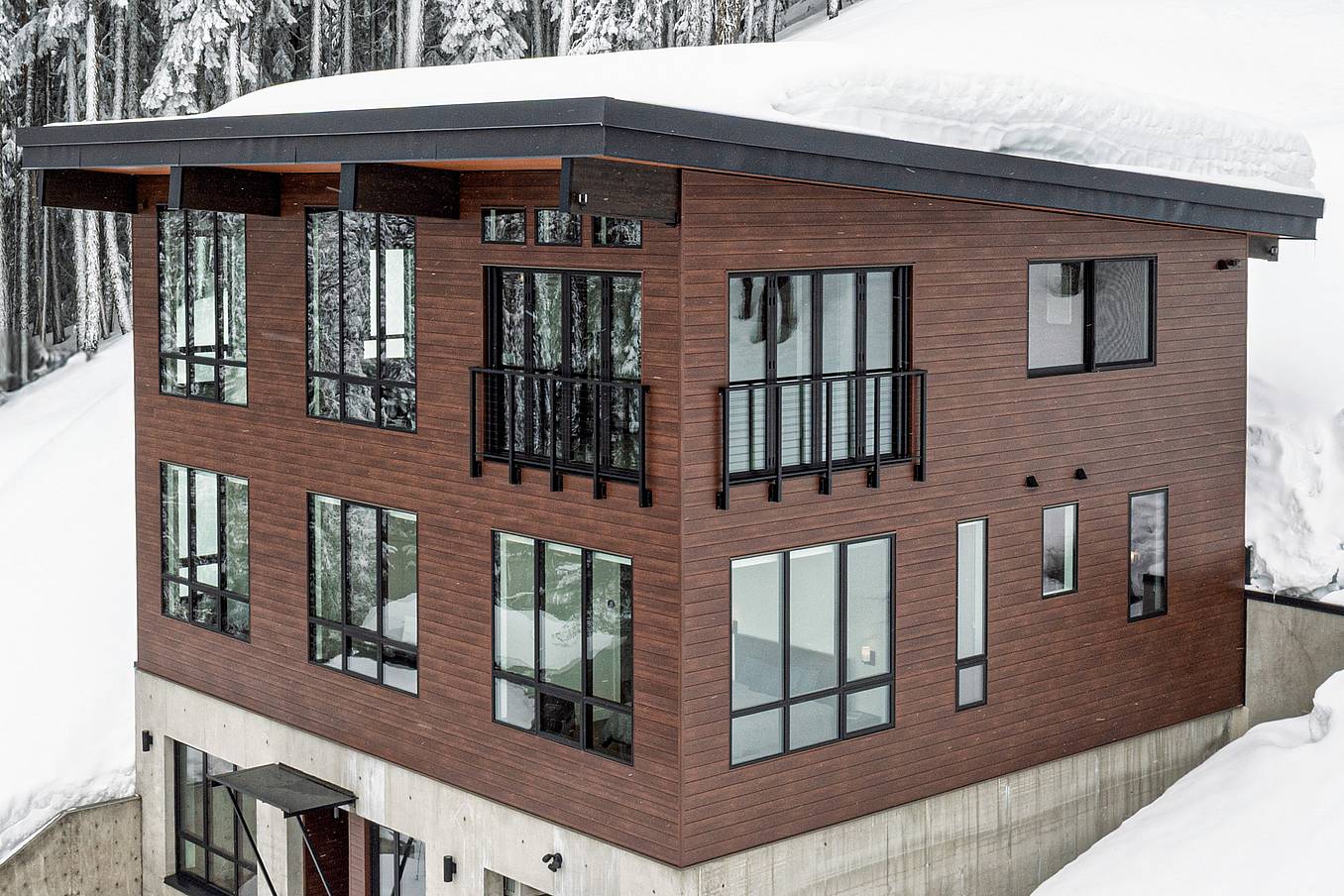 prefab home with bifold glass doors