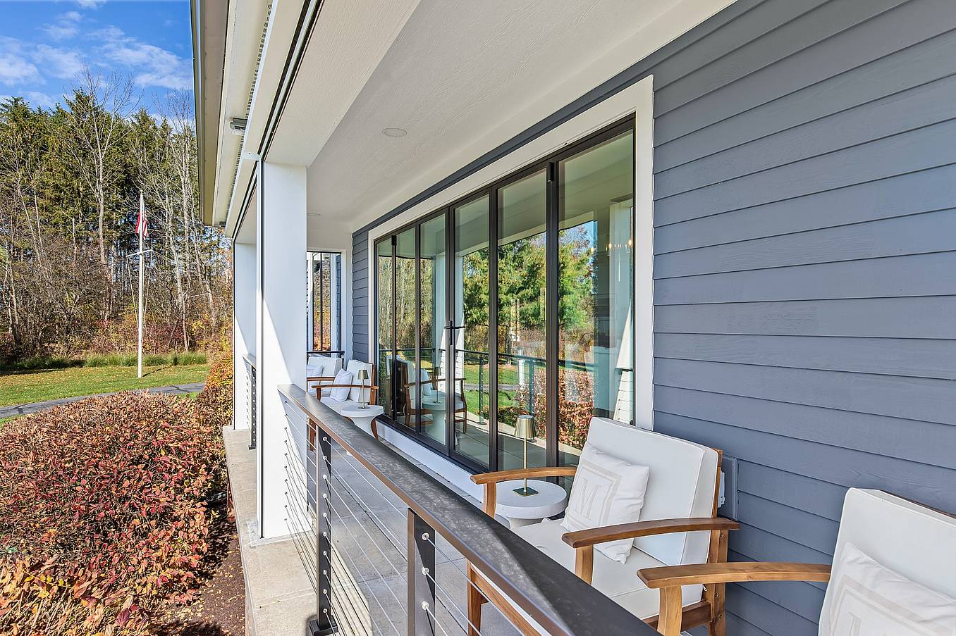 NanaWall Generation 4 bifold glass doors in a lakefront remodel