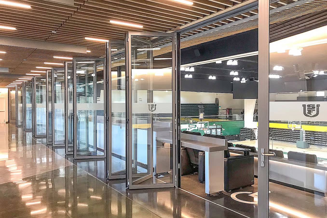 A NanaWall unique configuration first FourFold panel sets in opening glass wall systems