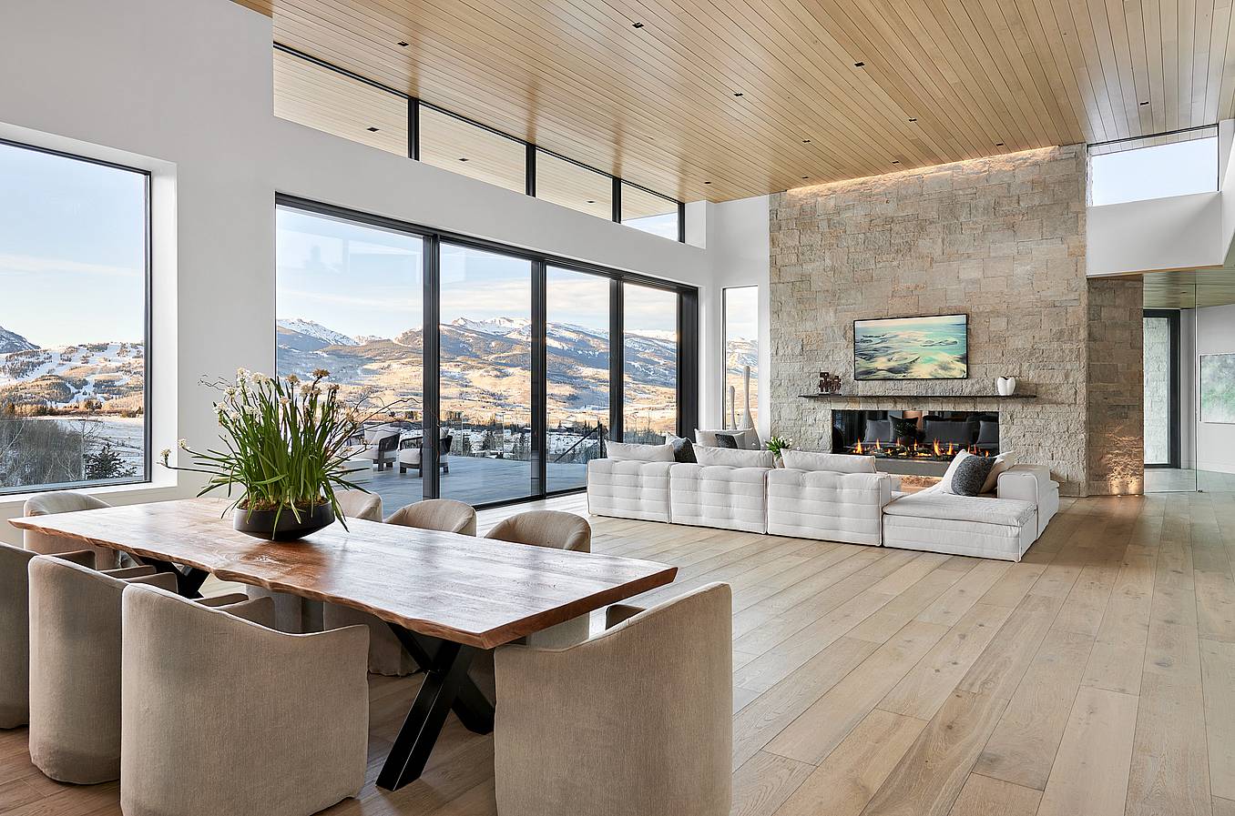 modern mountain living with minimal sliding glass wall system