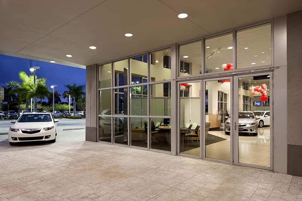 NanaWall SL73 impact-rated folding glass wall system at a commercial facility in Florida, tested for HVHZ requirements and daily operational durability