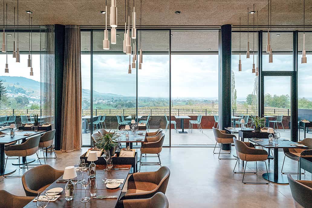 NanaWall minimal sliding glass wall system at a winery project, combining large glass panels with precision engineering and verified system performance