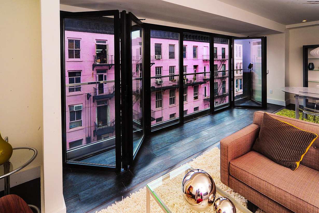 new york city midrise multifamily homes with balconies for property differentiation