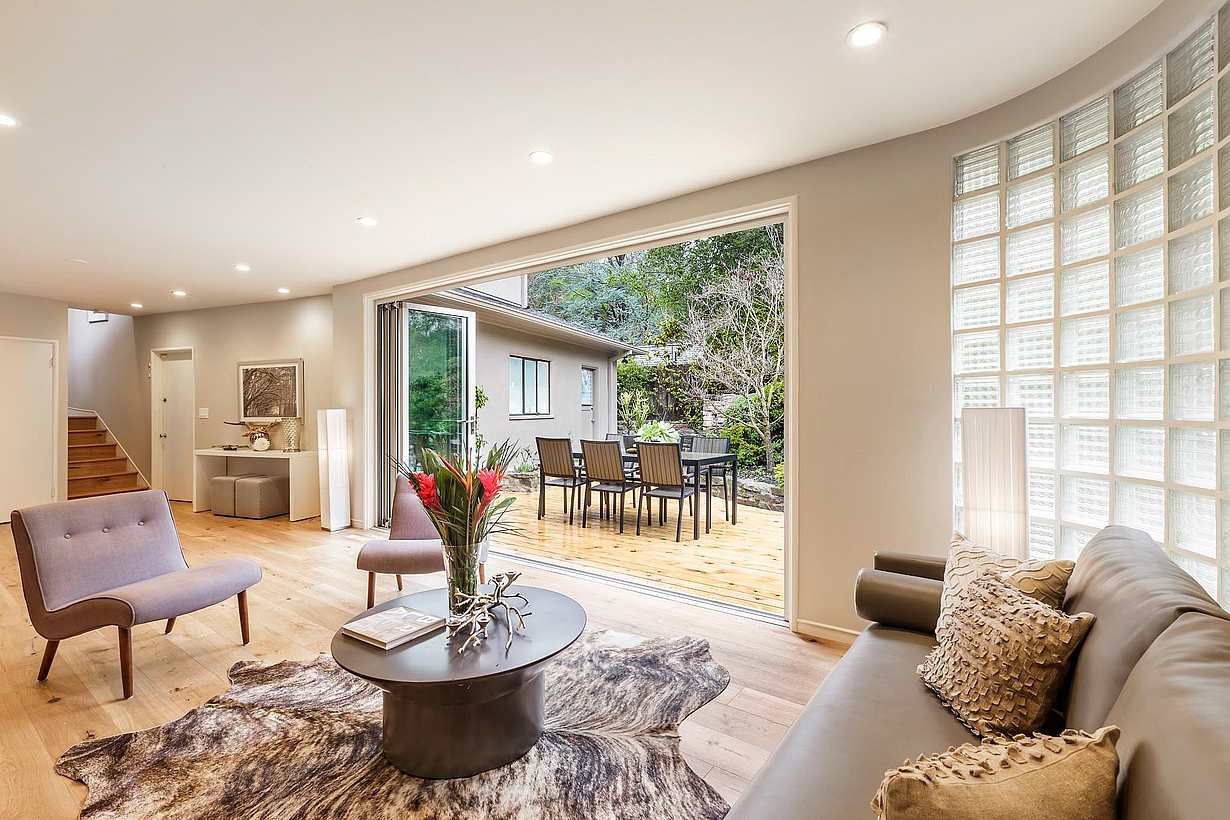 bifold door to the outside in living room remodel