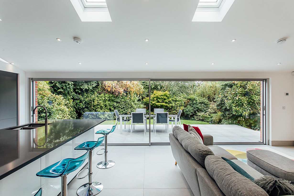 minimal framed sliding glass walls in living room for a modern makeover