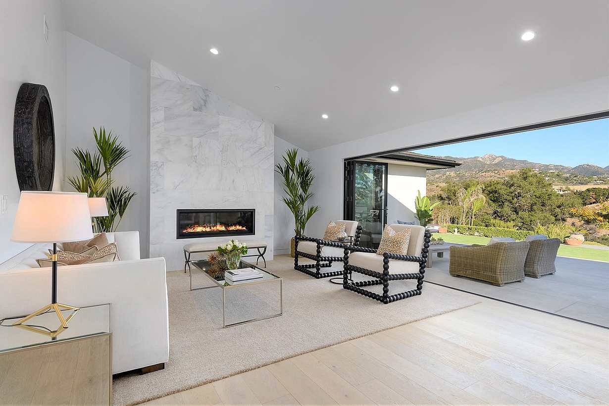 California ranchstyle home remodeled with folding glass walls in living room