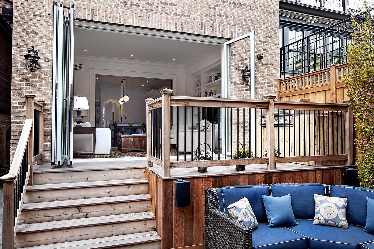 traditional slider replaced with folding patio door