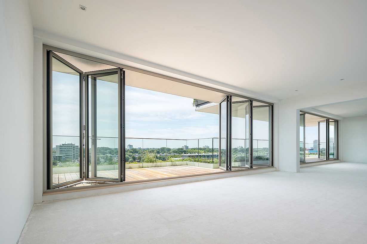 Folding glass wall systems multifamily