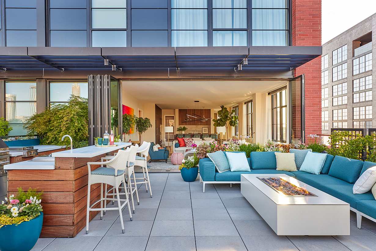 multifamily rooftop penthouse folding glass walls 