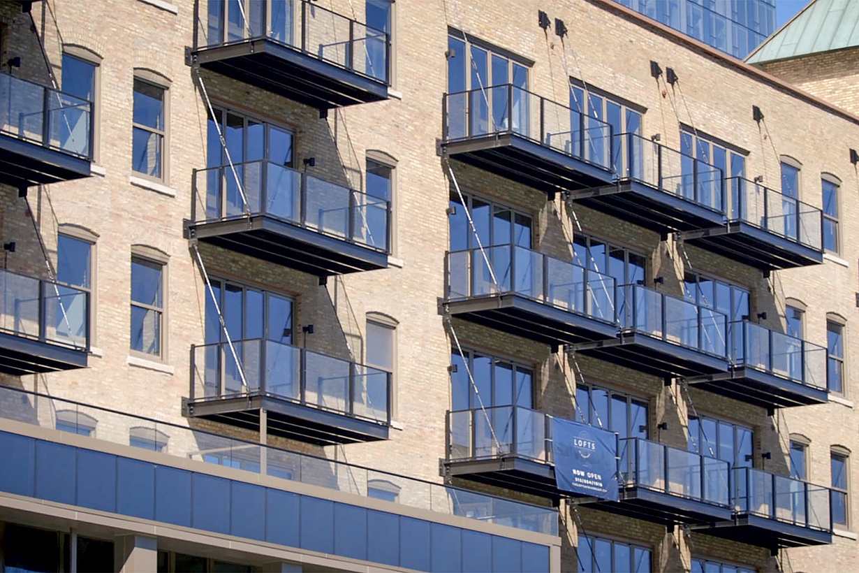 multifamily balcony design with NanaWall folding glass walls