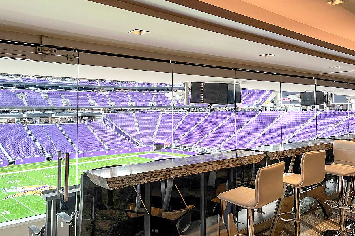 frameless stacking glass wall systems at Minnesota Vikings