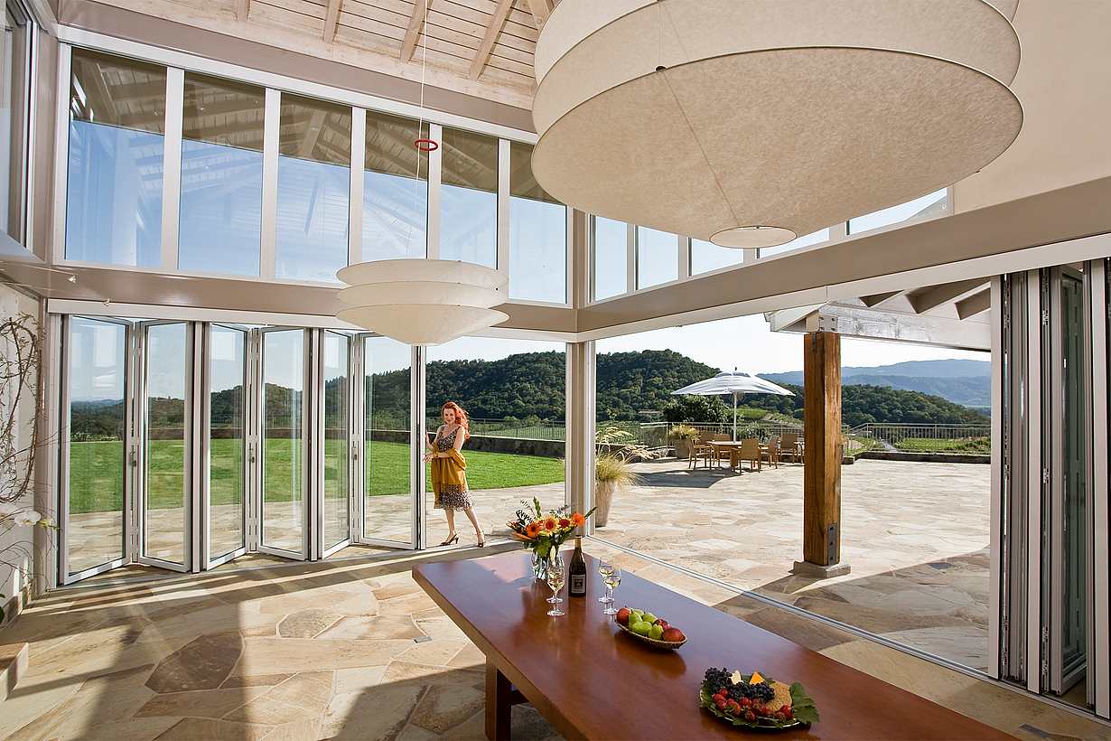 floor to ceiling retractable glass walls