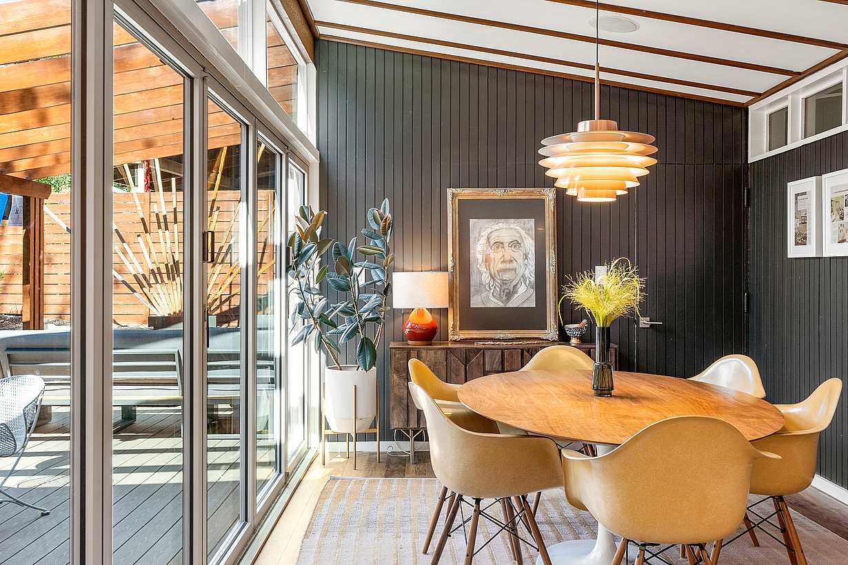 Mid-Century Modern dining room with NanaWall folding glass wall
