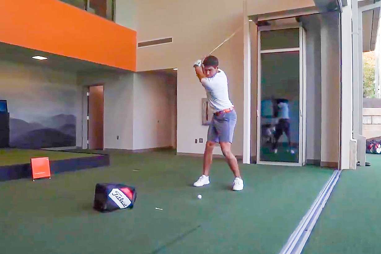 golfer with single track sliding glass wall system