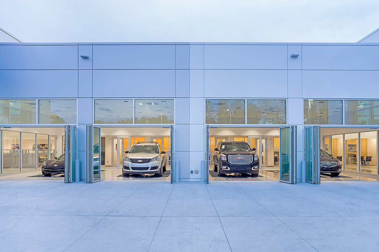 commercial glass doors in auto dealership design