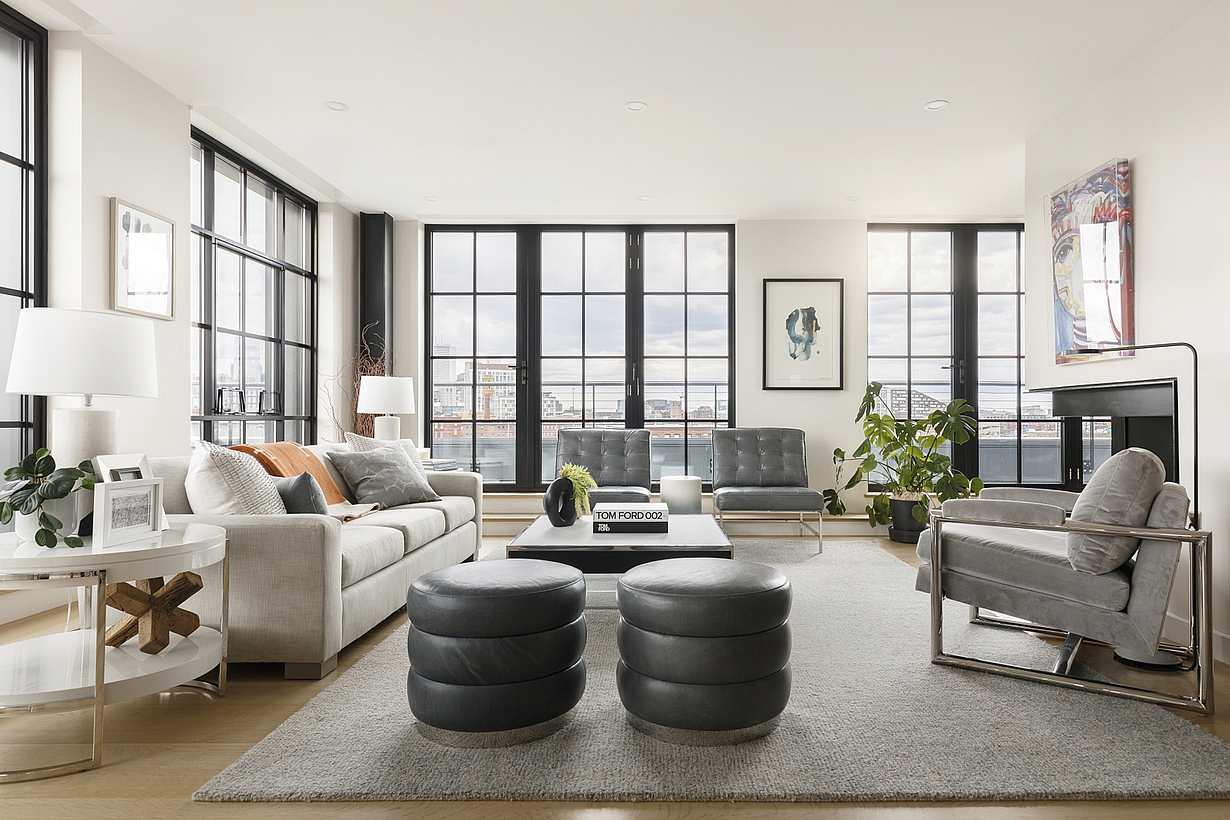 Multifamily living room with a large window - simulated divided lites design