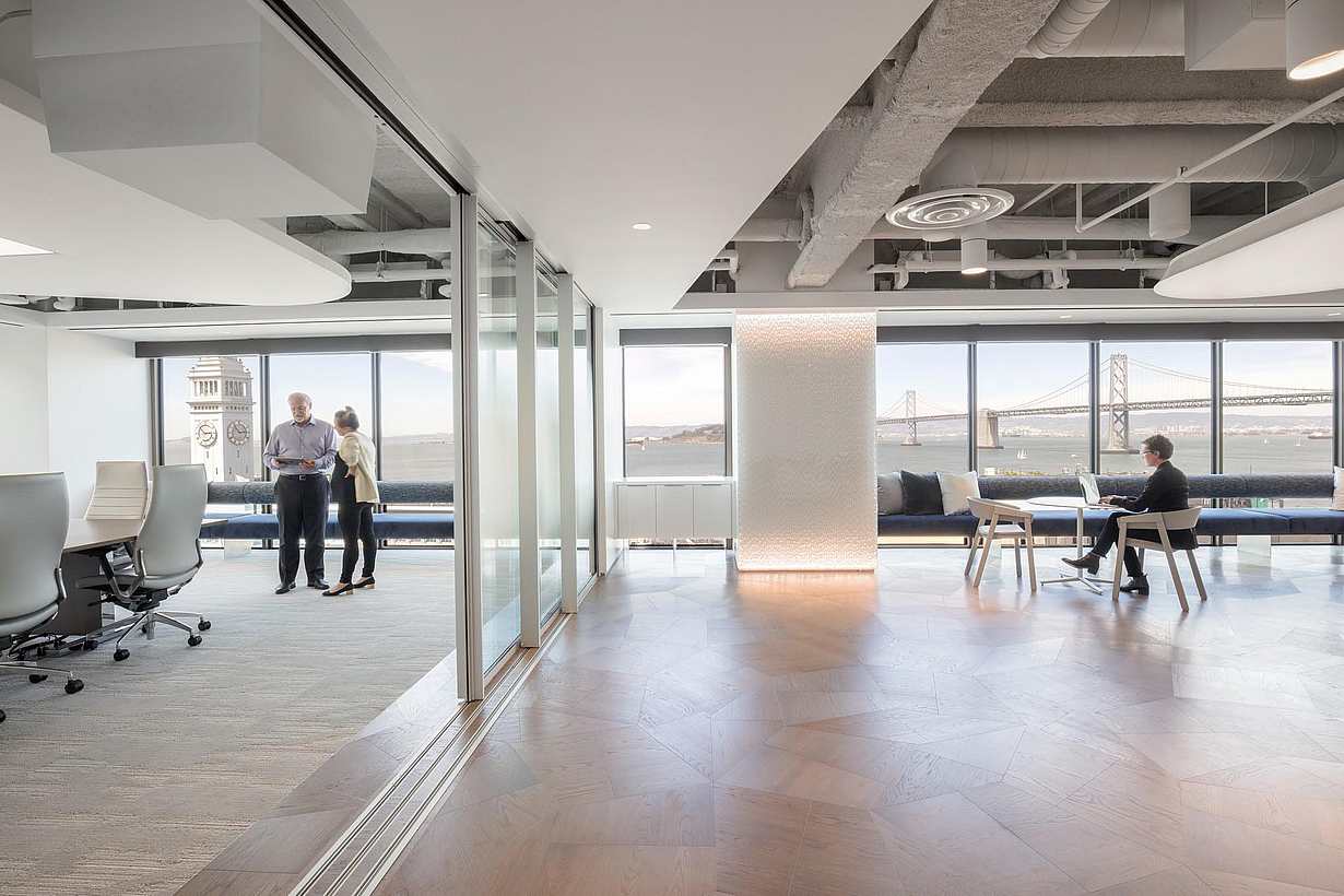 Corporate lobby with Cero minimal sliding glass walls opening into a work area