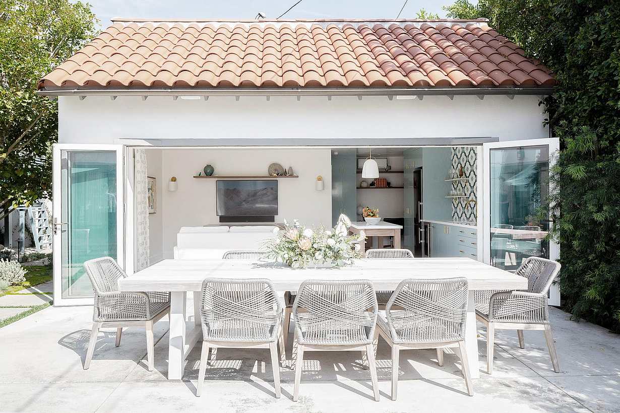 Accordion patio doors optimize indoor-outdoor living in Windsor ADU garage conversion with enhanced patio functionality