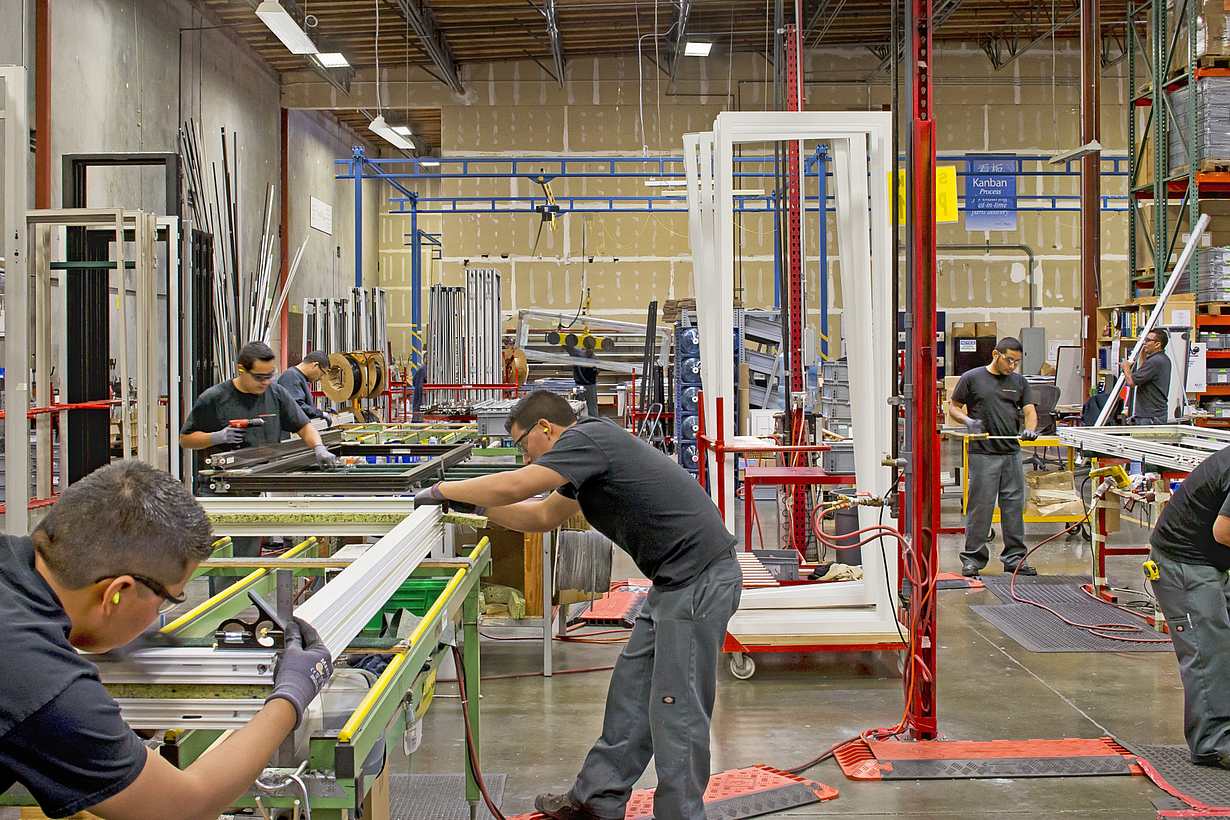NanaWall technicians assembling premium glass wall systems at the Richmond, California factory
