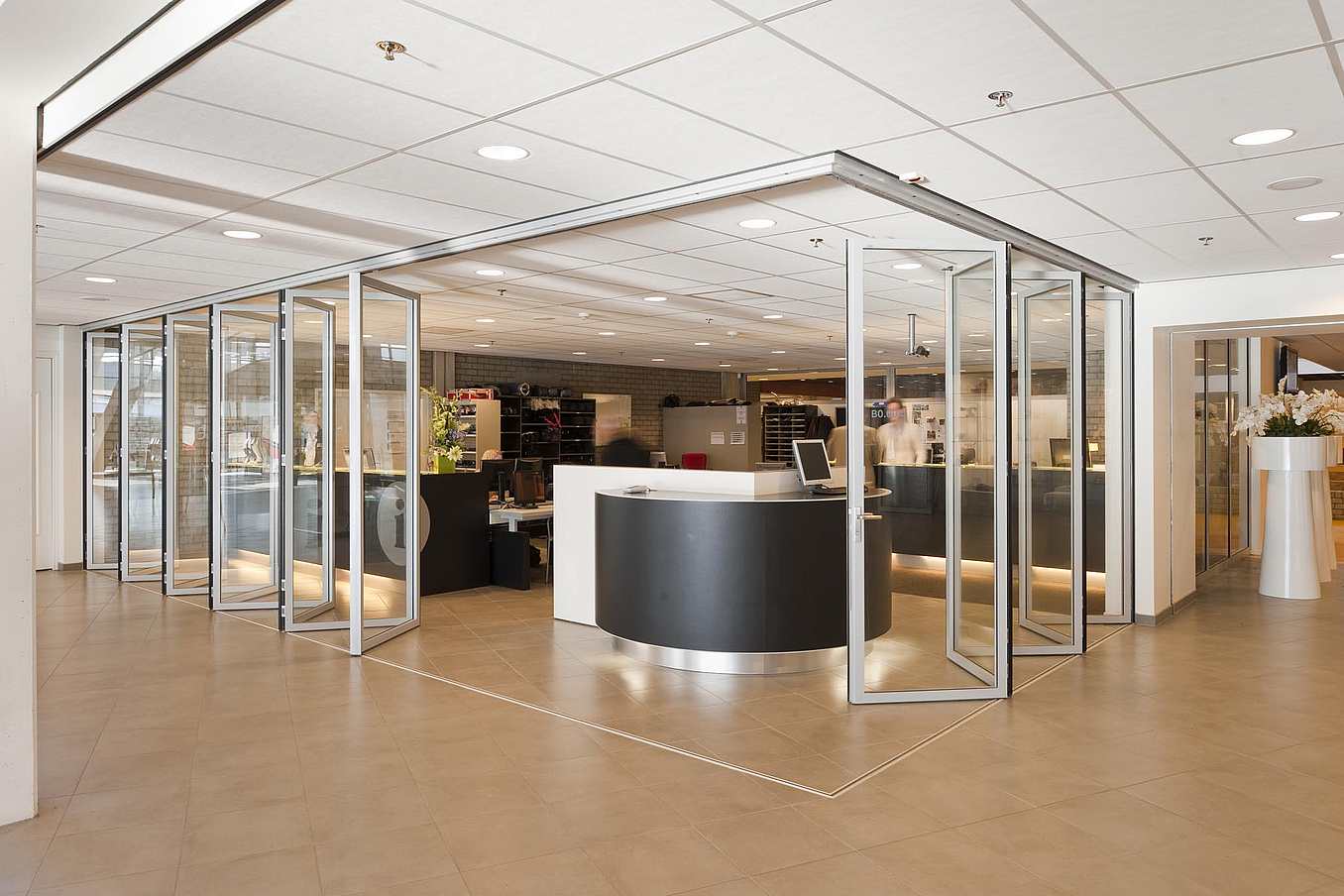 NanaWall SL45 system at Leuwaarden University, Netherlands, featuring large glass panels, thermal performance, and modern educational design