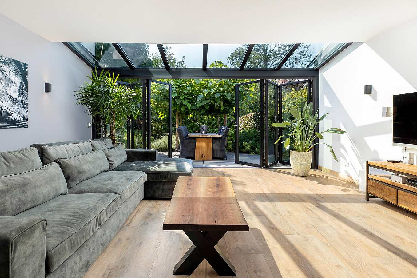 Retractable patio doors increase living space by seamlessly blending indoor and outdoor areas for enhanced living