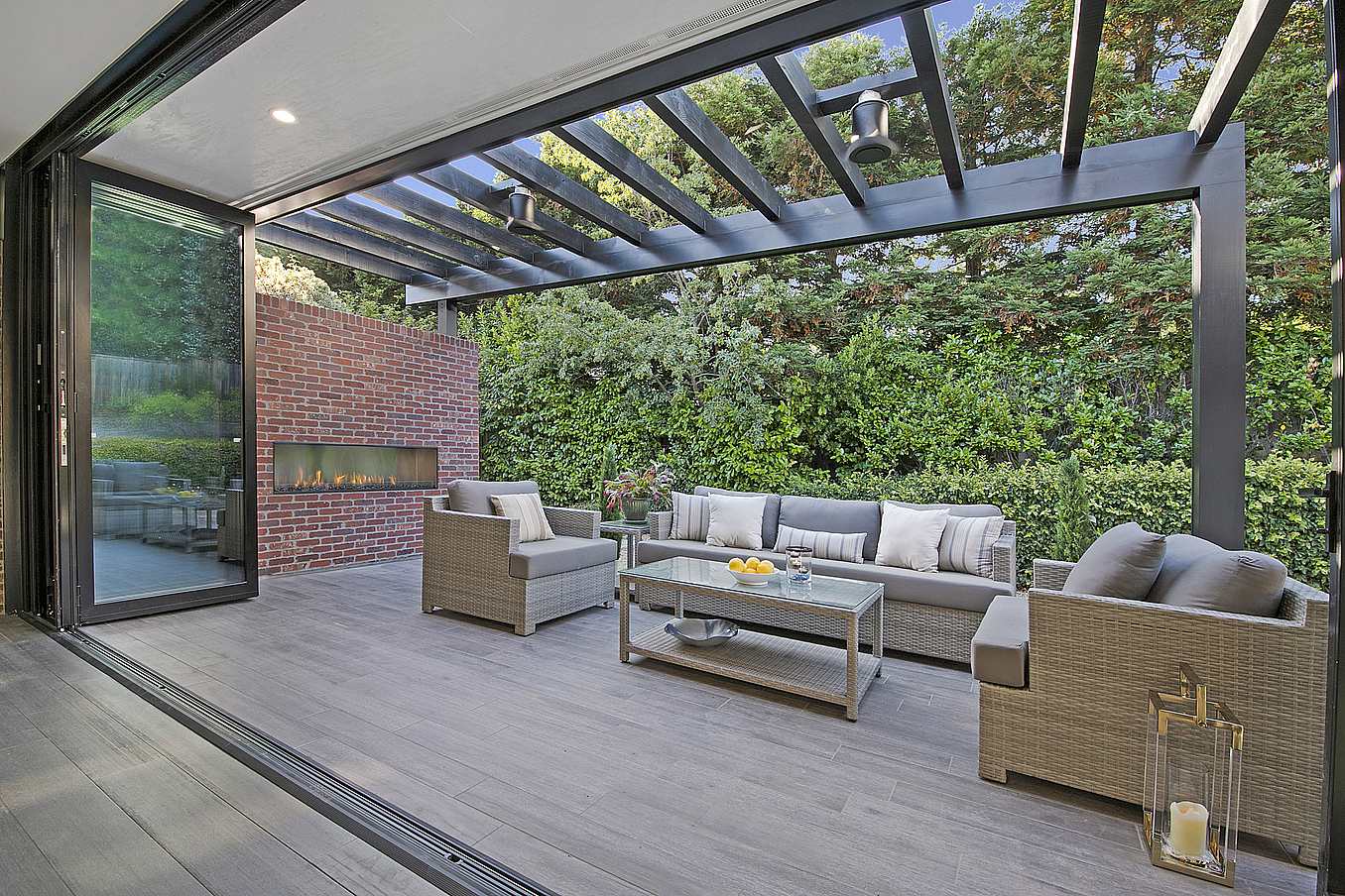 Retractable patio doors in Alamo, CA. ADU open to a serene garden, enhancing indoor-outdoor living with sleek design