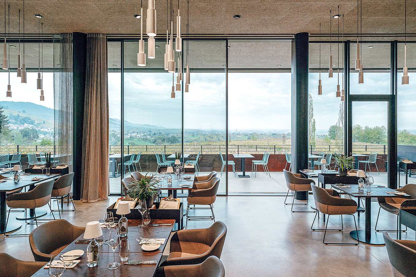 NanaWall minimal sliding glass wall system at a winery project, combining large glass panels with precision engineering and verified system performance