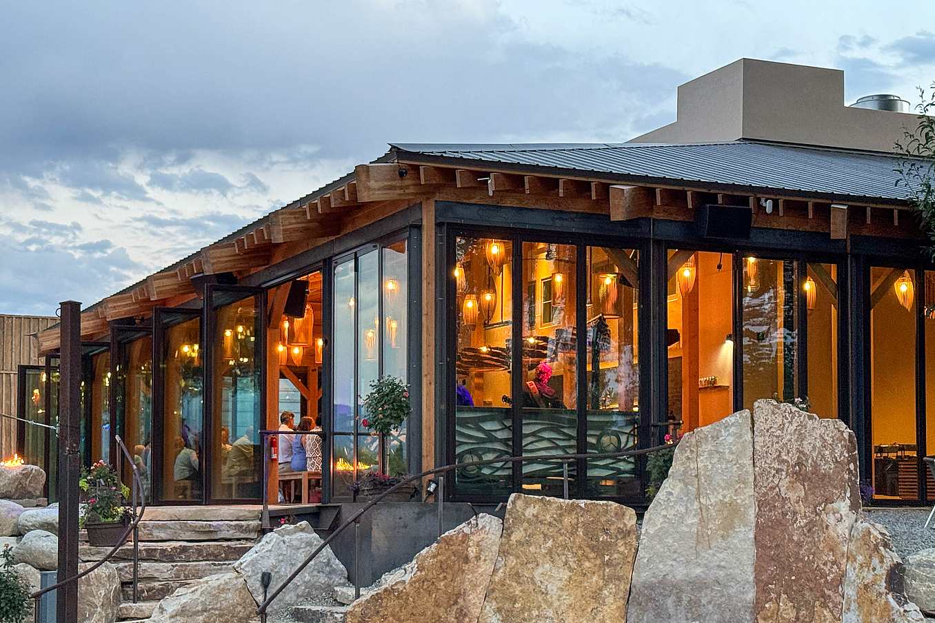 NanaWall NW Aluminum 640 folding glass wall system used in a commercial restaurant setting for wide openings and durability
