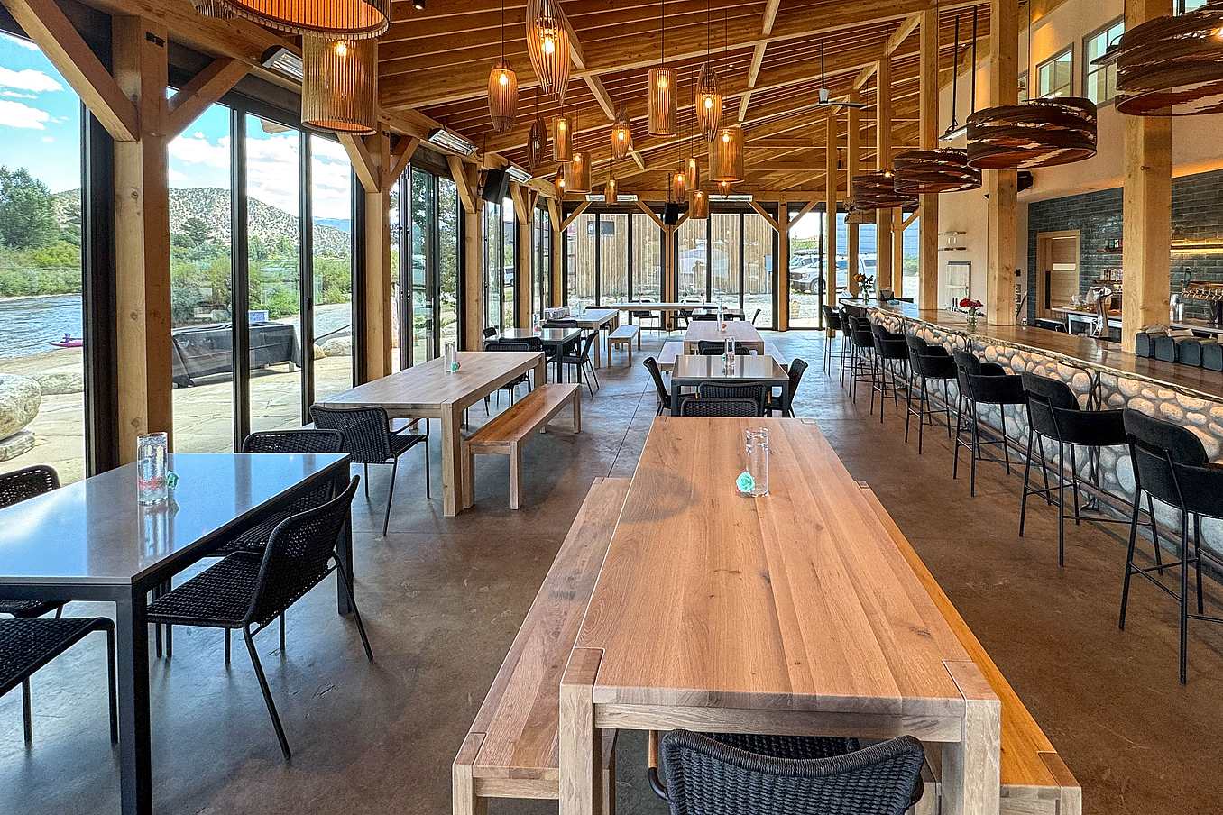 NanaWall NW Aluminum 640 thermally broken folding glass wall installed in a commercial restaurant, designed for frequent daily operation