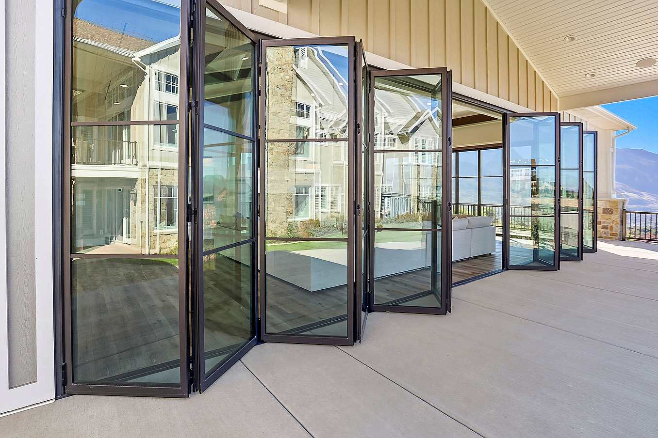 NanaWall NW Aluminum 640 thermally broken folding glass wall system opening a pavilion in Ogden, Utah, with large panel spans and indoor-outdoor integration