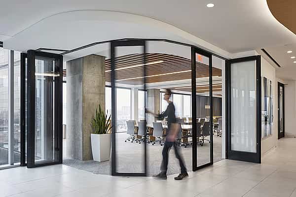 NanaWall HSW stacking glass doors, panels stacking into parking bay to create flexible space