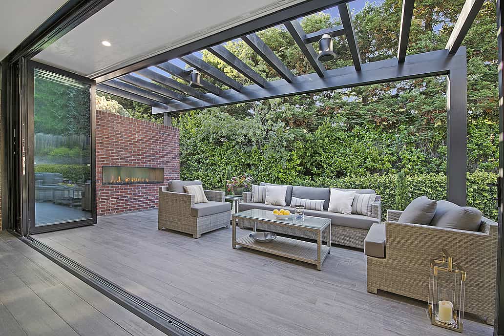 Retractable patio doors in Alamo, CA. ADU open to a serene garden, enhancing indoor-outdoor living with sleek design