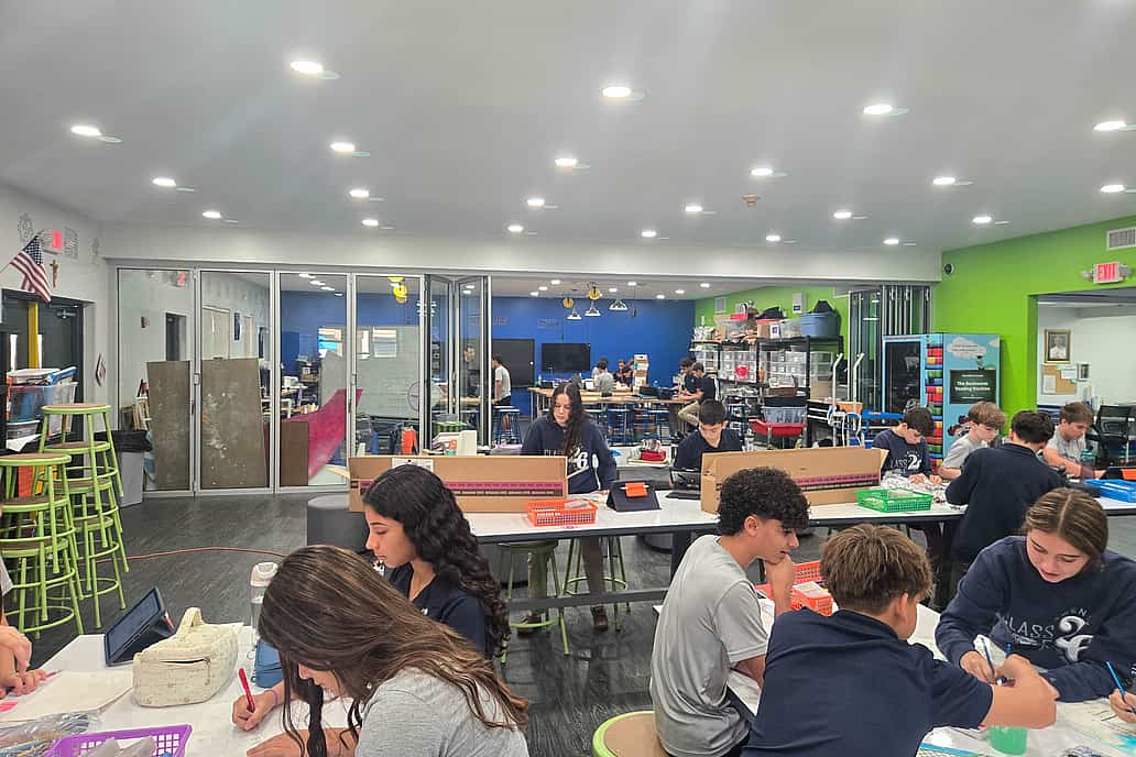 Classroom at St. Bonaventure Catholic School (Davie, FL) featuring NanaWall NW Acoustical 645 folding glass wall dividing learning zones