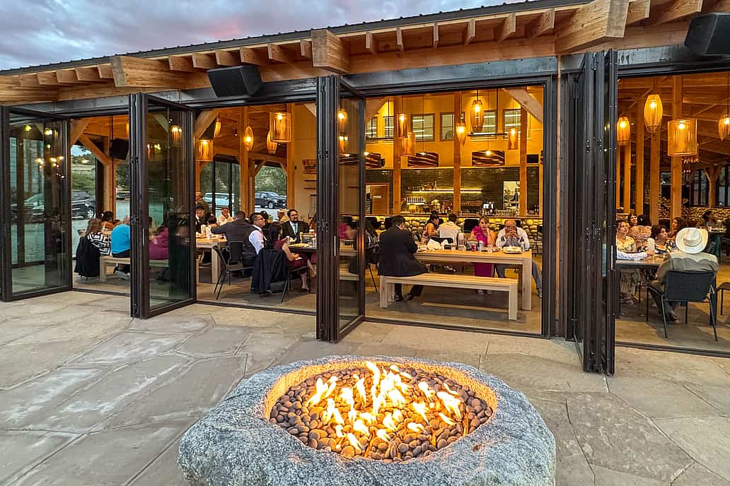The Beach Restaurant in Buena Vista CO with NanaWall NW Aluminum 640 folding glass wall opening dining area to patio