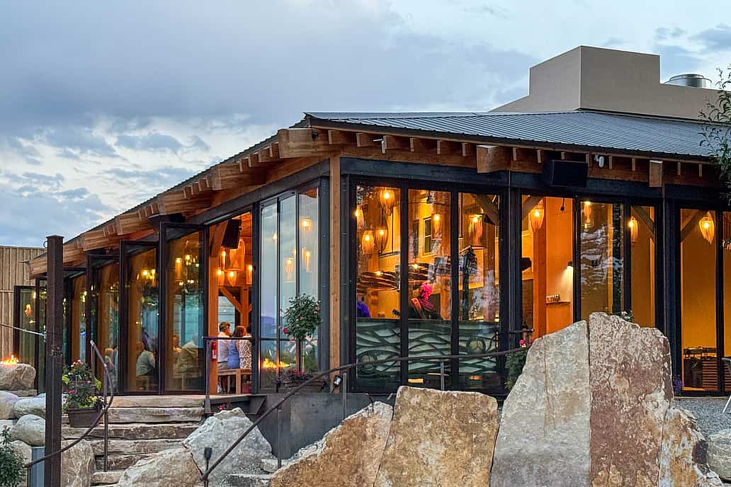 NanaWall NW Aluminum 640 folding glass wall system used in a commercial restaurant setting for wide openings and durability