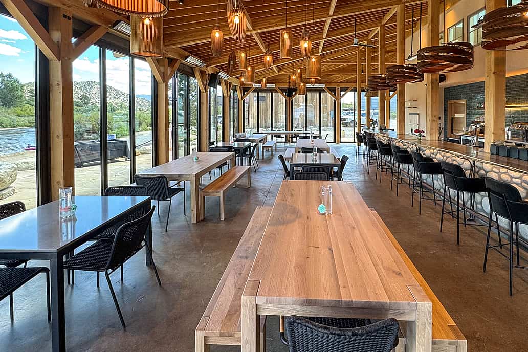 NanaWall NW Aluminum 640 thermally broken folding glass wall installed in a commercial restaurant, designed for frequent daily operation