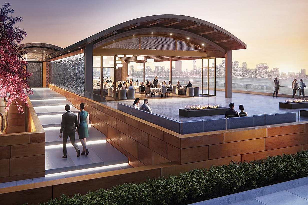 moveable glass walls in waterfront restaurant open to the patio and view