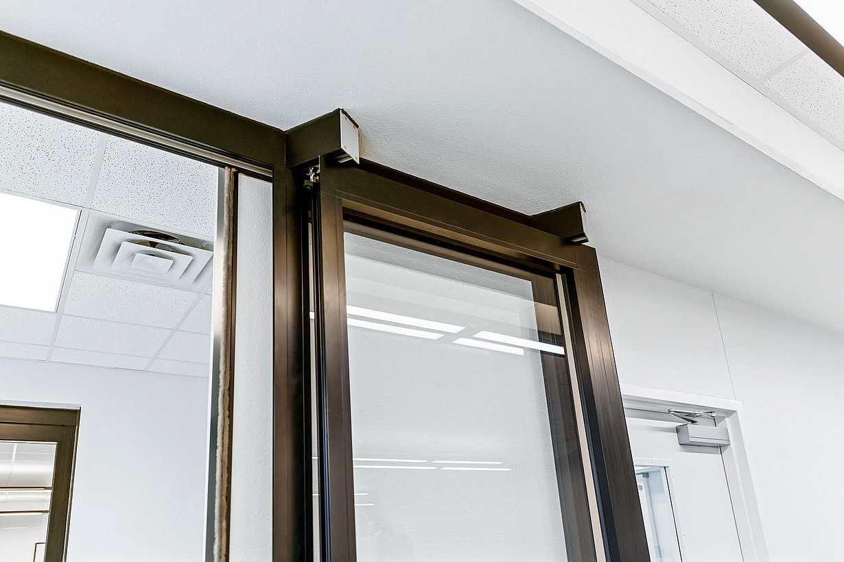 NanaWall HSW stacking glass doors park remotely in learning hub design