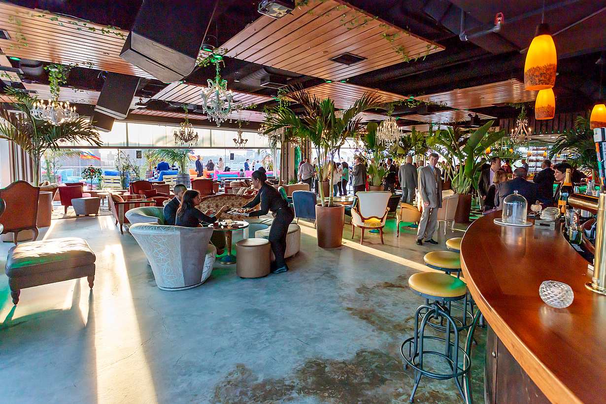 rooftop bar with collapsible glass walls