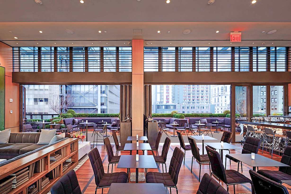 post-covid design for hotels on rooftop with commercial glass walls