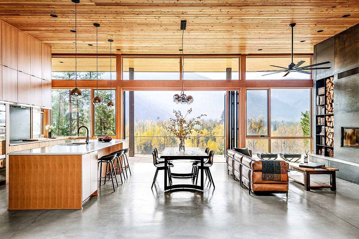 mountain home with clad folding glass wall systems